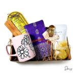 Spiritual gift box with incense, incense holder, mug, honey, tea, and notebook
