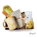 Spiritual gift box with incense, incense holder, mug, honey, tea, and notebook